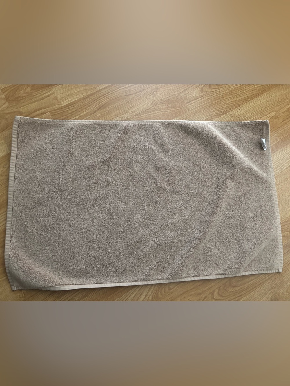 Neutral beige bath rug